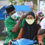 Cegah Covid-19 Meluas, GP Ansor di Lamongan Bagi-bagi Masker