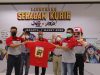 Tampil Beda! JNE Resmikan Seragam Kurir Karya Ilustrator Marvel & DC Comics Ario Anindito